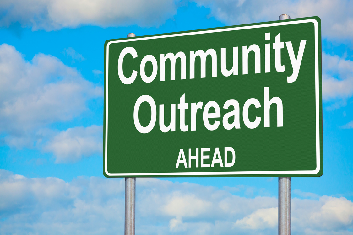 Community Outreach Ahead Highway Sign